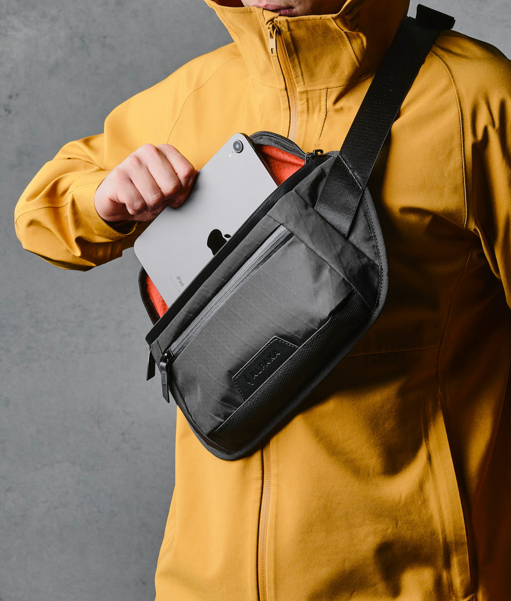Stylish Alpaka Bravo Sling Mini V2 bag, perfect for daily use and travel, combining durability with sleek design.