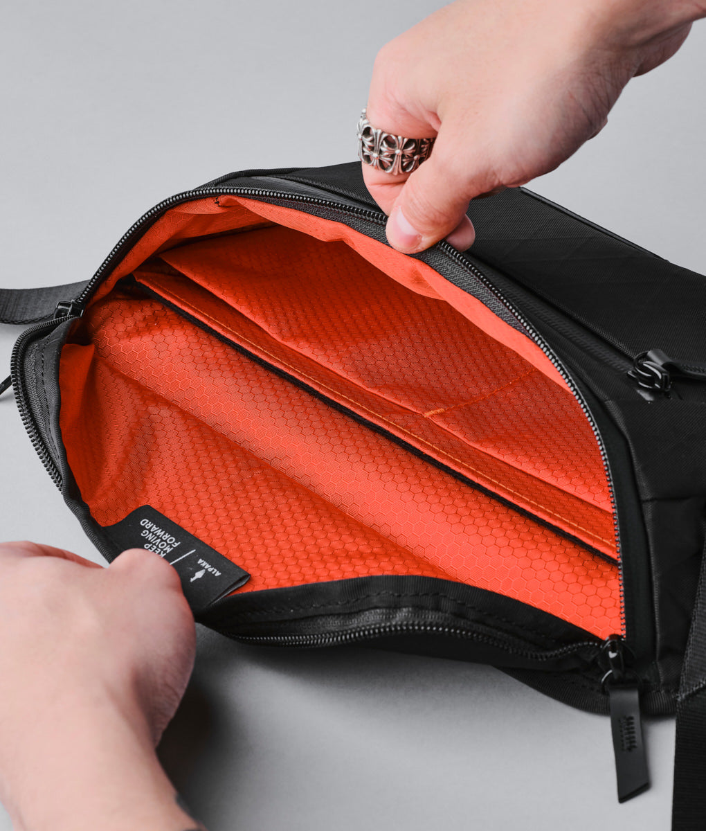 Stylish Alpaka Bravo Sling Mini V2 bag, perfect for daily use and travel, combining durability with sleek design.