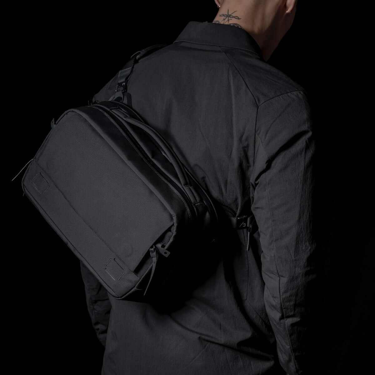 Black Ember Grip Sling 12L backpack designed for urban mobility and durable everyday carry