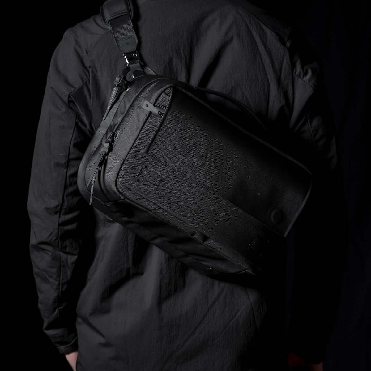 Black Ember Grip Sling 12L backpack designed for urban mobility and durable everyday carry