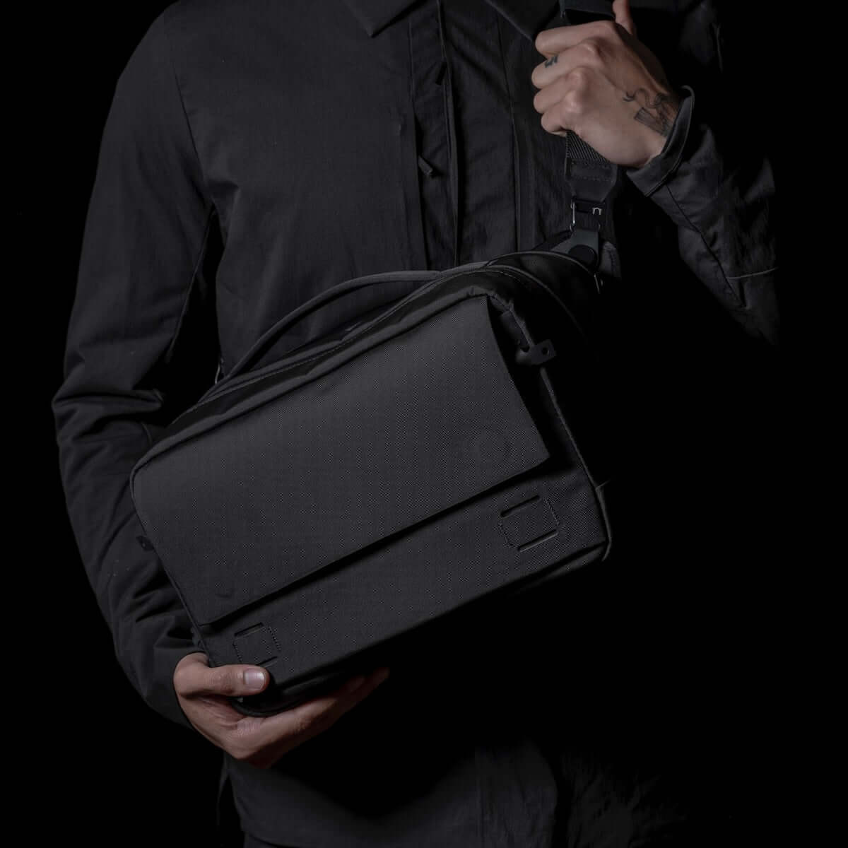 Black Ember Grip Sling 12L backpack designed for urban mobility and durable everyday carry