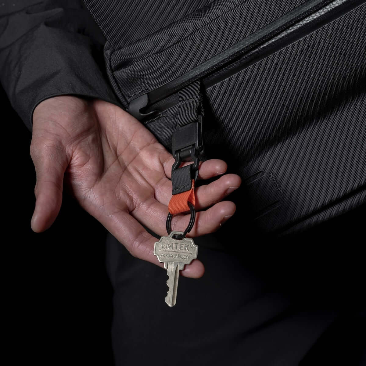 Black Ember Grip Sling 12L backpack designed for urban mobility and durable everyday carry