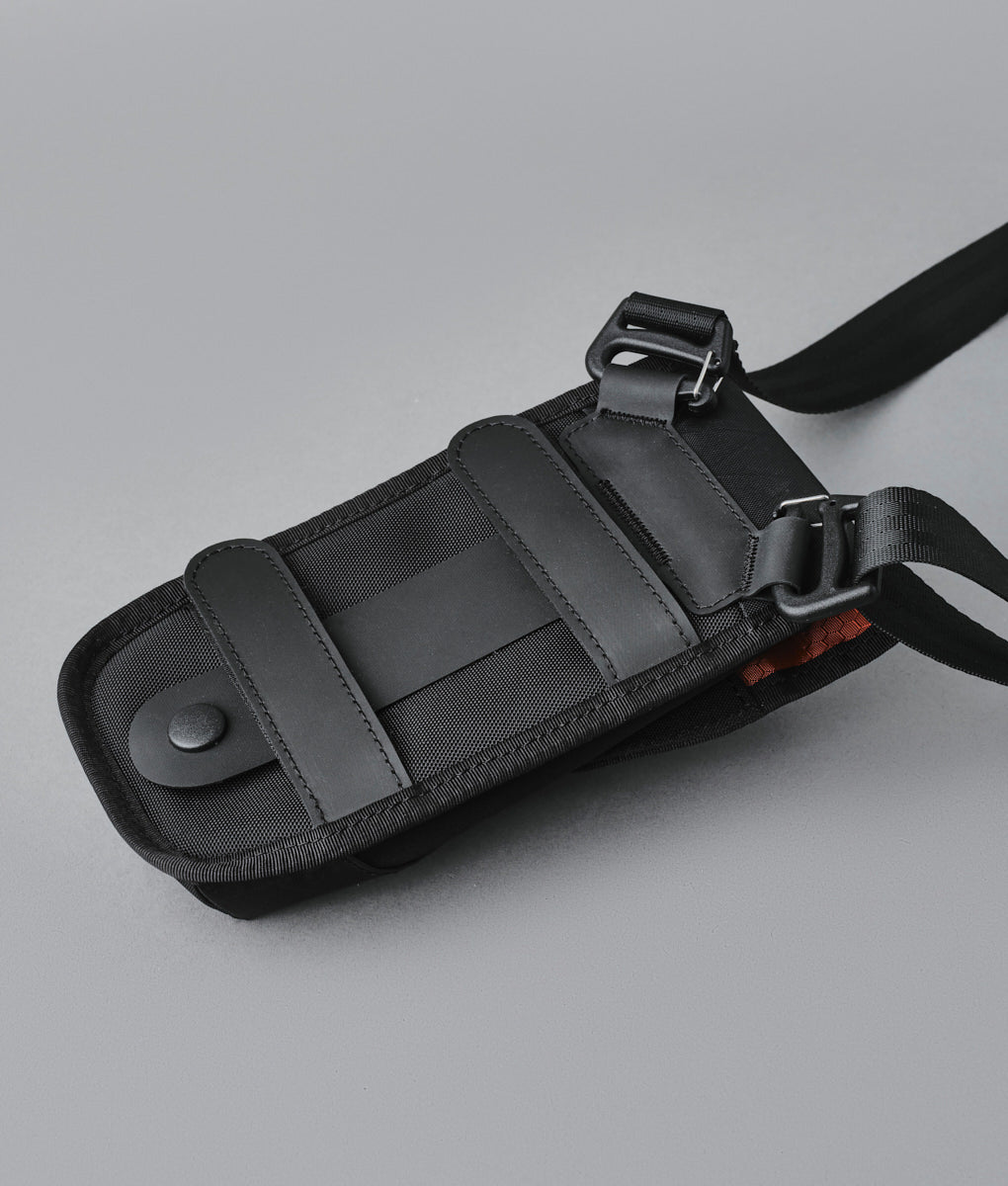 Alpaka Modular Phone Sling V2 designed for versatile carrying and secure phone storage in sleek, durable materials