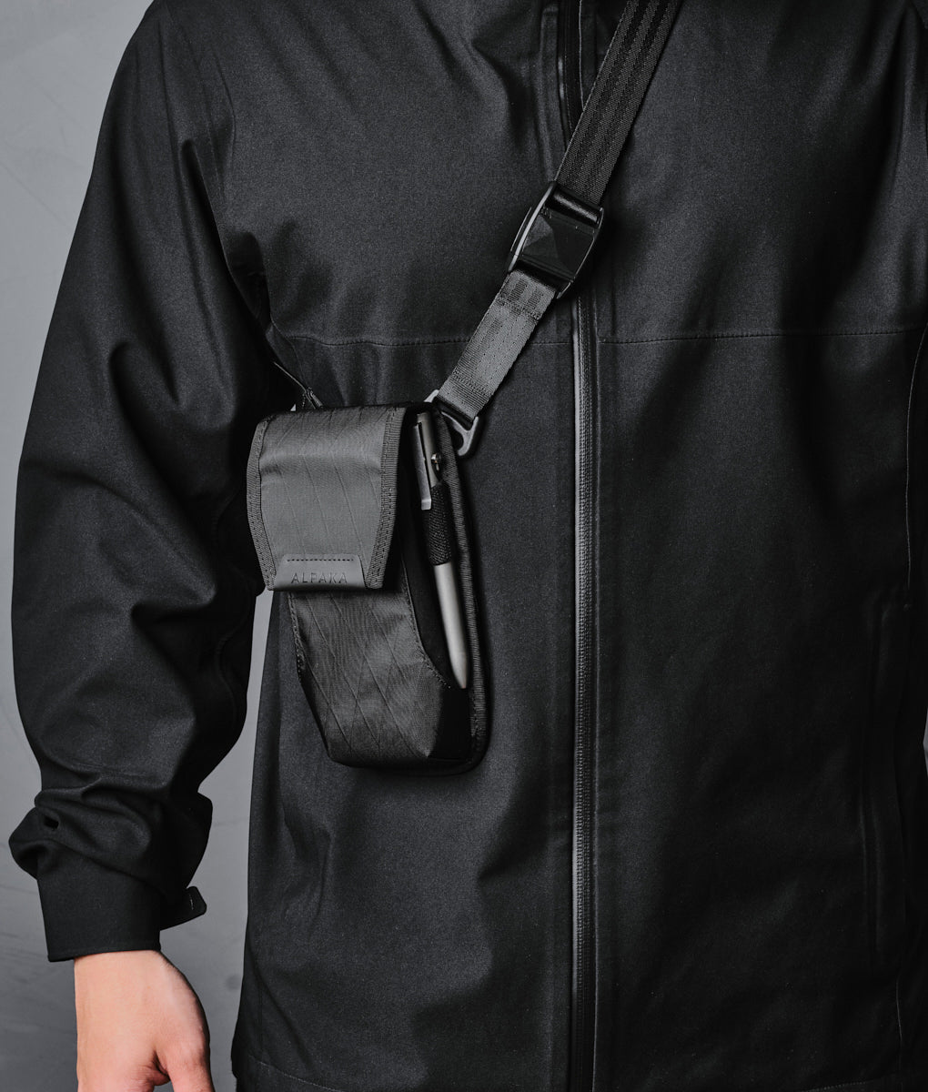 Alpaka Modular Phone Sling V2 designed for versatile carrying and secure phone storage in sleek, durable materials