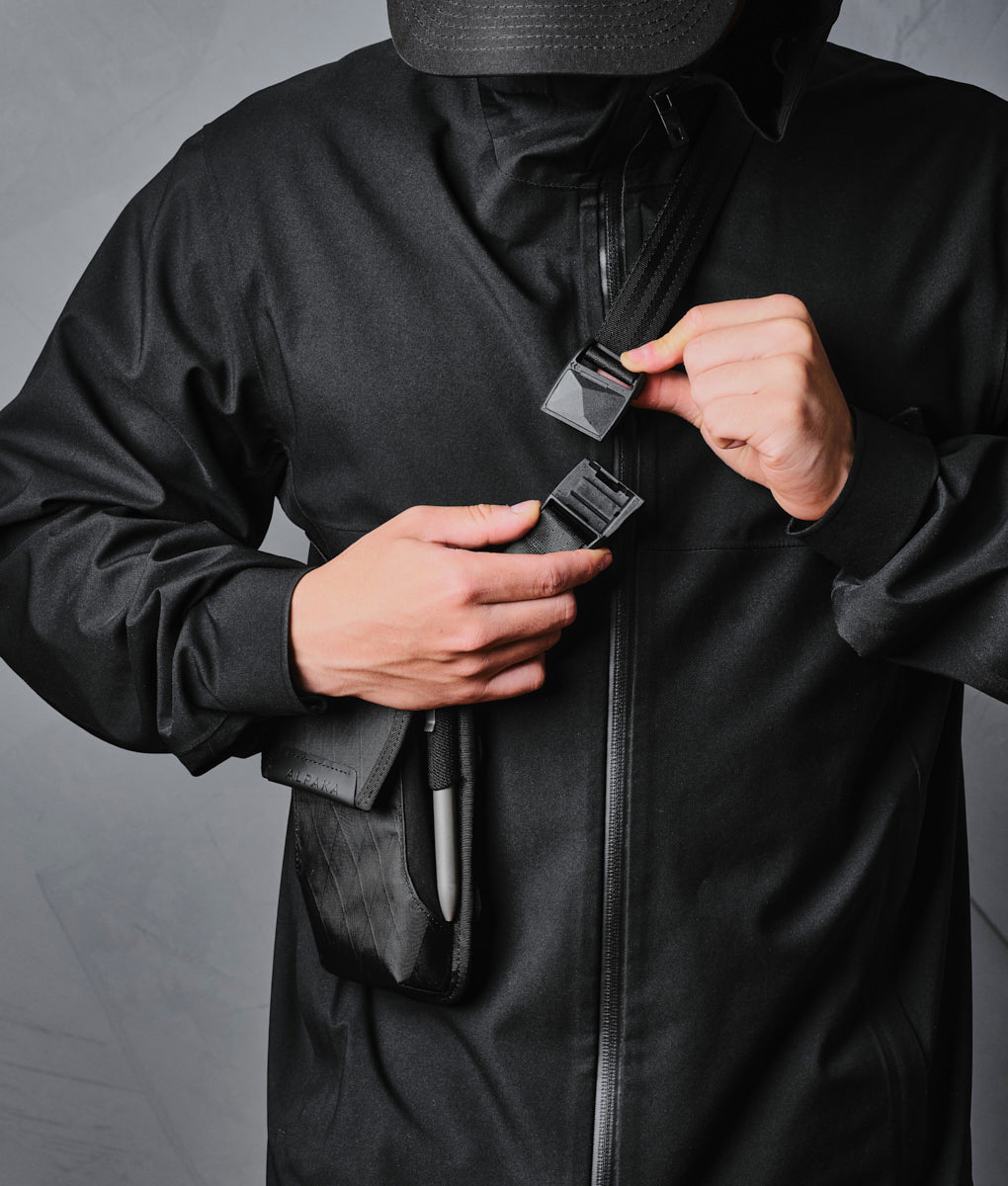 Alpaka Modular Phone Sling V2 designed for versatile carrying and secure phone storage in sleek, durable materials