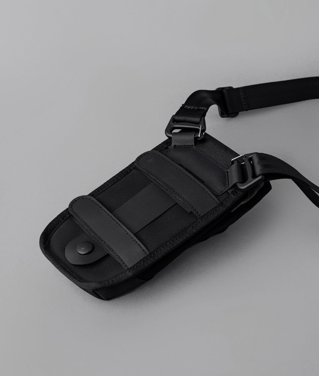 Alpaka Modular Phone Sling V2 designed for versatile carrying and secure phone storage in sleek, durable materials