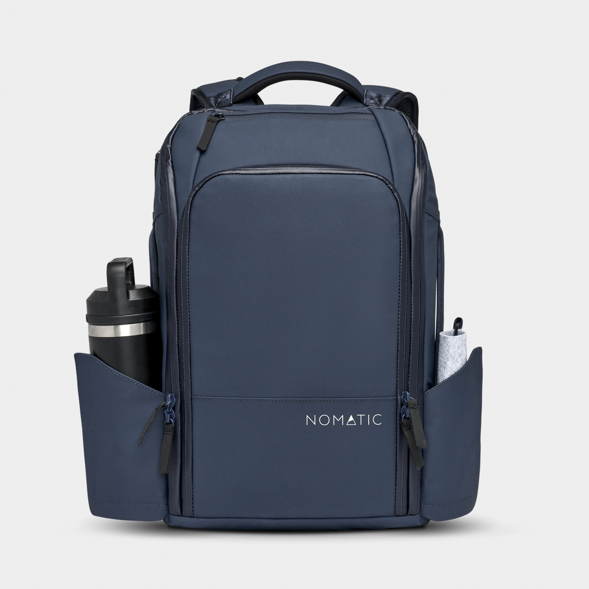 Nomatic Travel Pack in navy blue with expandable design, dual side pockets, and weather-resistant fabric for organized travel and laptop storage.