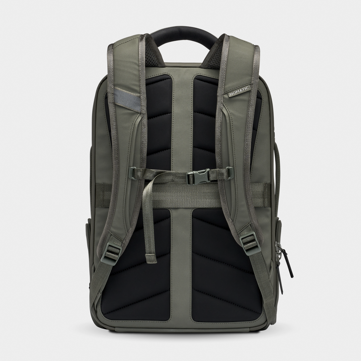 Nomatic Travel Pack backpack rear view showing padded shoulder straps, sternum strap, and weather-resistant olive green fabric for travel comfort.