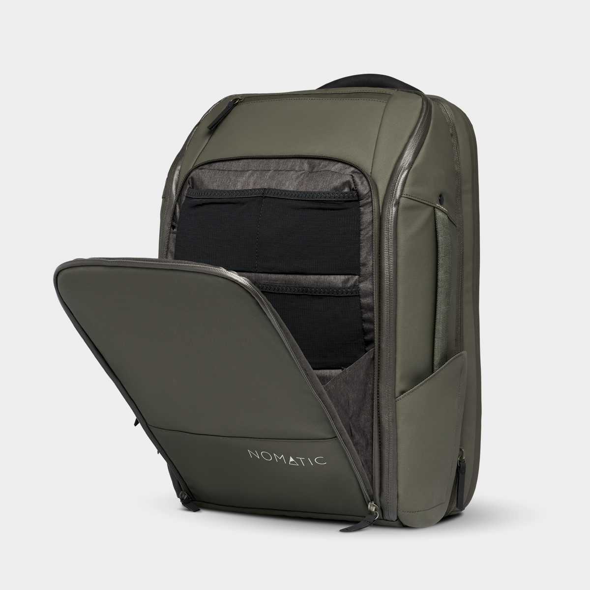 Nomatic Travel Pack backpack in olive green, shown with front compartment open revealing organized interior pockets for tech and travel essentials.