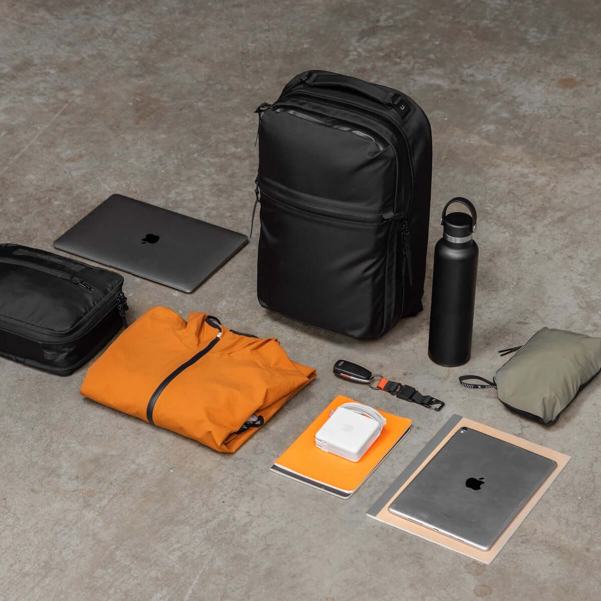 Black Ember CITADEL 20L backpack, a sleek and weatherproof EDC travel backpack in matte black.