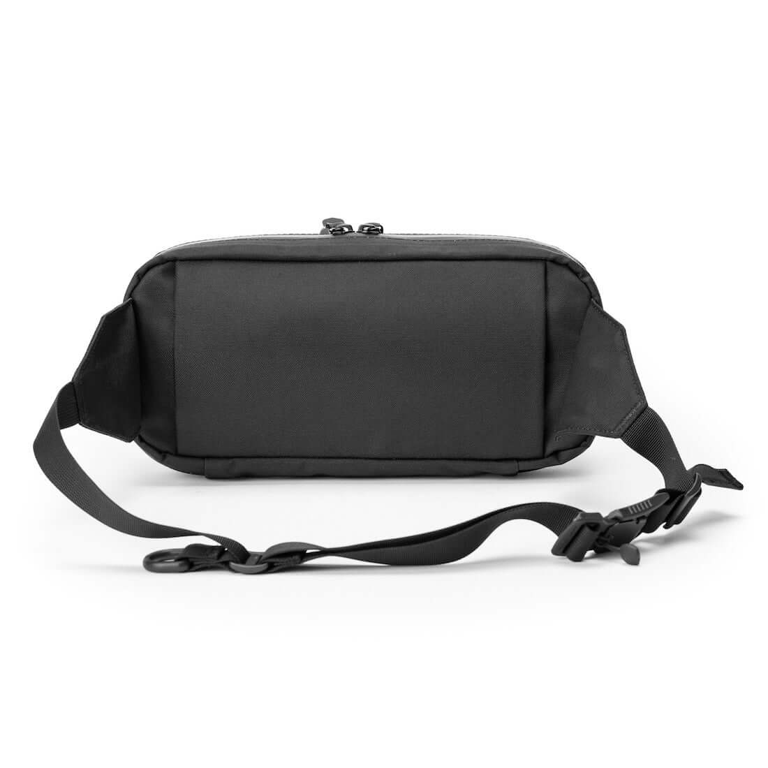 Black Ember TKS Sling bag showcasing sleek design and durable materials for urban carry solutions.