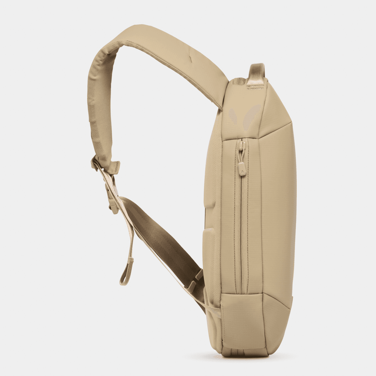 Nomatic Navigator RS Sling 10L in beige, showcasing its sleek side profile and functional design.